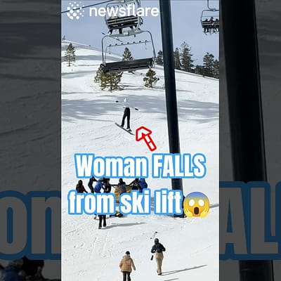 Woman Falls Of Super High Ski Lift
