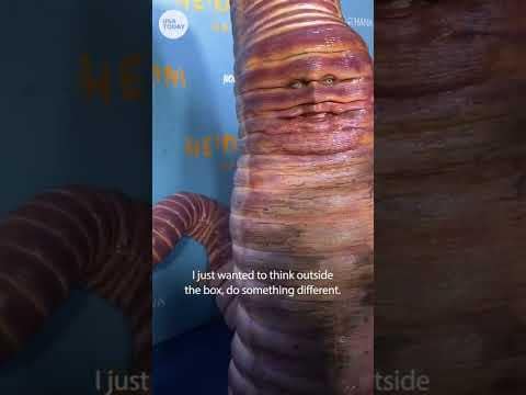 Heidi Klum inches into Halloween party in worm costume | USA TODAY #Shorts