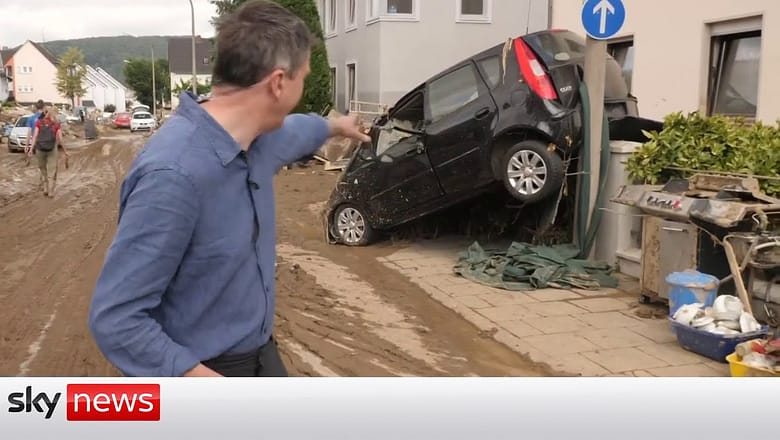 WATCH: Sky reporter walks through German street devastated by floods