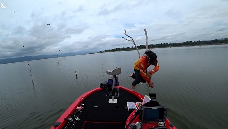 Fisherman jumps into water to escape hornet attack