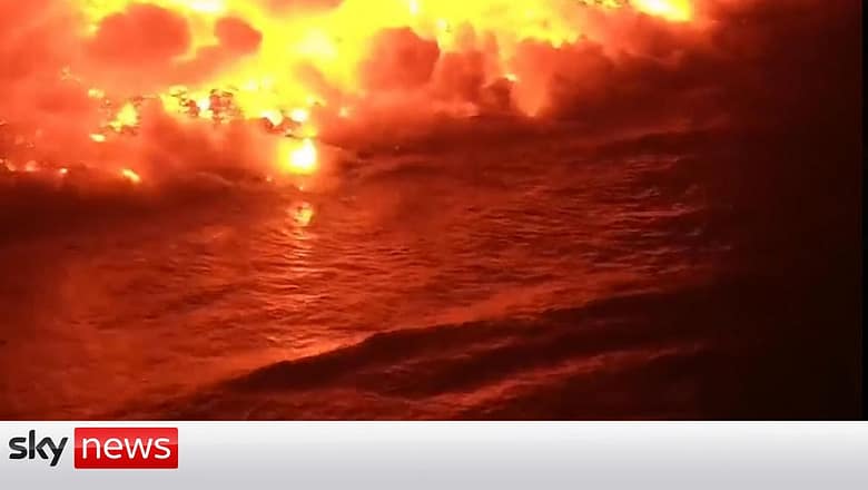 Life on La Palma continues as lava hits sea