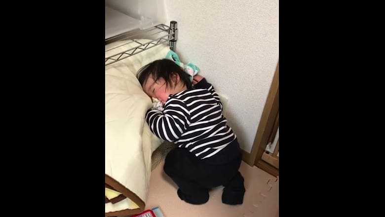 Toddler Trying To Stay Awake In A Hilarious Way