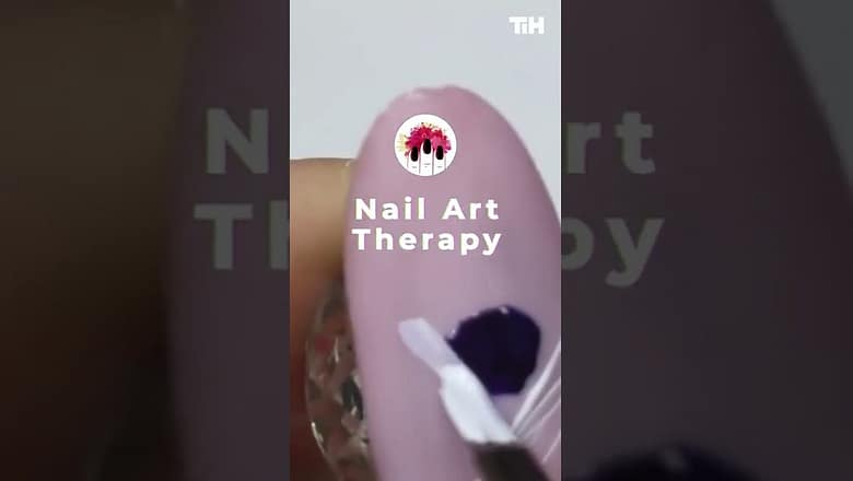 Person Does Beautiful Nail Art
