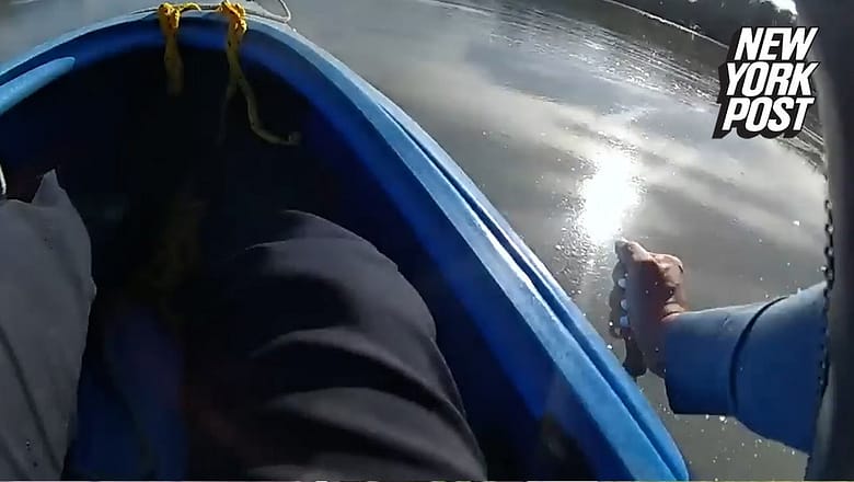 Dramatic video shows cop using screwdrivers as oars while rescuing pilot | New York Post