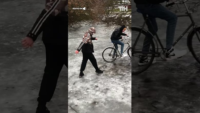 Guy Falls Through Frozen Lake After His Friend Kicks A Hole In It