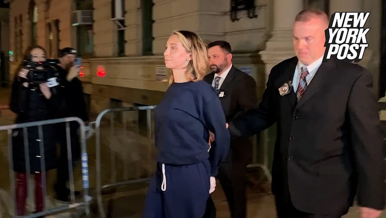 Nikki Secondino grins for cameras after she’s charged with killing her NYC dad, Carlo | NY Post