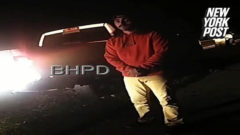 Wild moment alleged drunk driver backflips during field sobriety test | New York Post