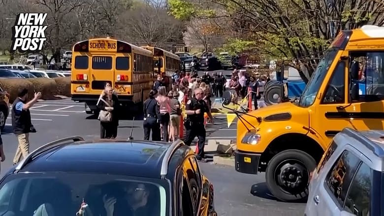 Children led by law enforcement after Nashville school shooting | New York Post