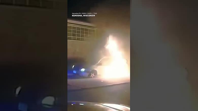 Wisconsin police pull 84-year-old man to safety as van bursts into flames #Shorts