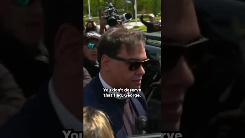 ‘You don’t deserve that flag, George!’ Rep. George Santos hounded after arrest #Shorts