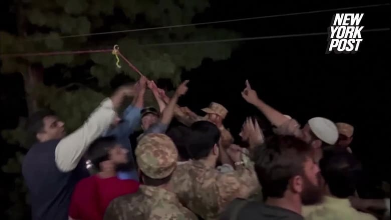 7 kids, 1 teacher rescued from cable car left dangling 900 feet above Pakistan ravine
