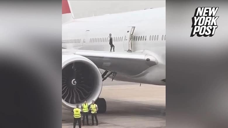 Airline crew blasted for ‘life threatening’ photo shoot on plane wing