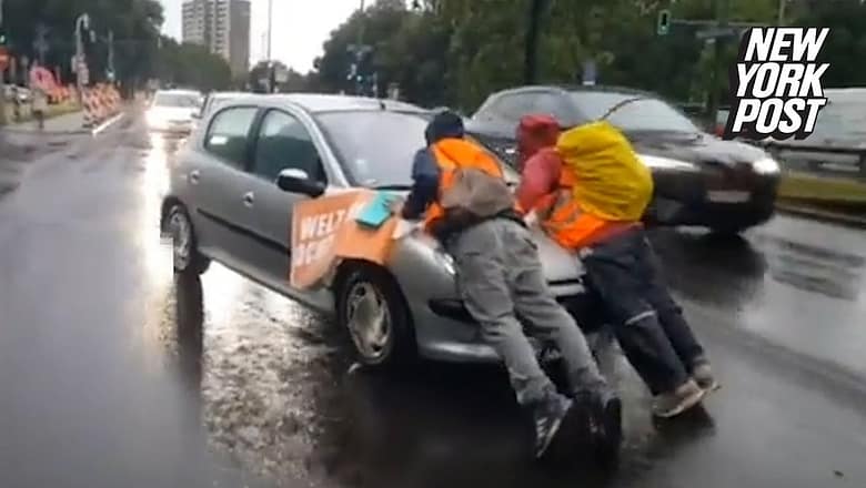 Irate drivers ram into climate protesters blocking traffic, drag them hundreds of feet down highway