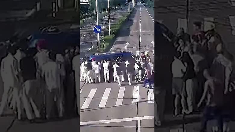Good Samaritans flip car to save driver pinned underneath #Shorts