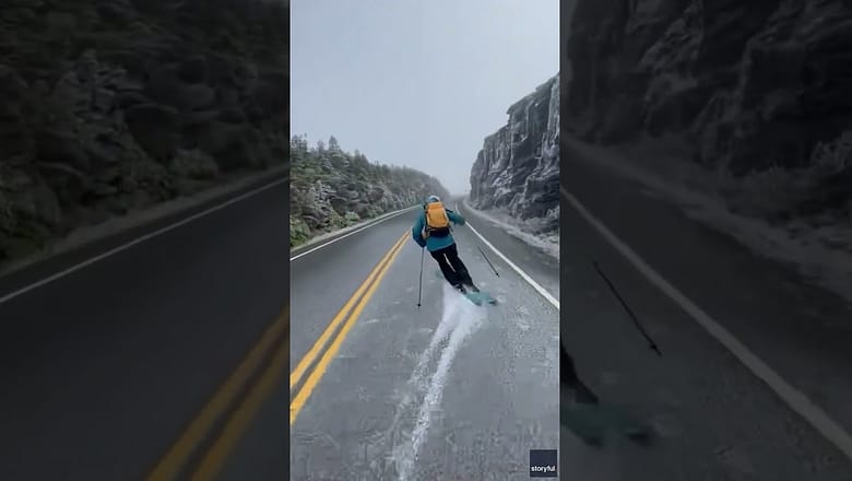 A light snowfall was just enough for two skiers to glide down a road #Shorts