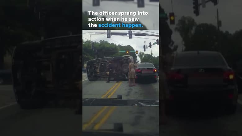 Officer pulls elderly man from flipped car #Shorts