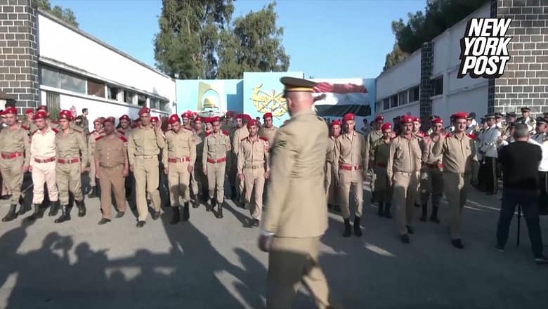 Syria holds funeral for military academy attack victims