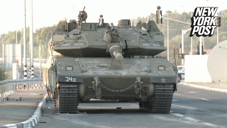 Tanks line up at Gaza border as ground invasion appears imminent
