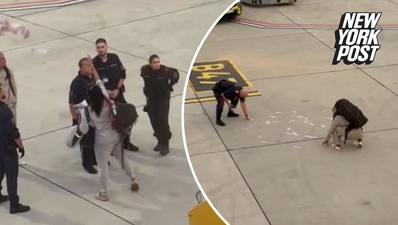 Wild video shows ‘unruly’ airline passenger throw $6,000 on tarmac after refusing to pay for upgrade