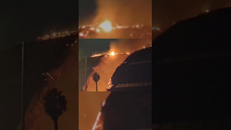 Massive fire erupts at historic WWII hangar in California, damages the structure #Shorts