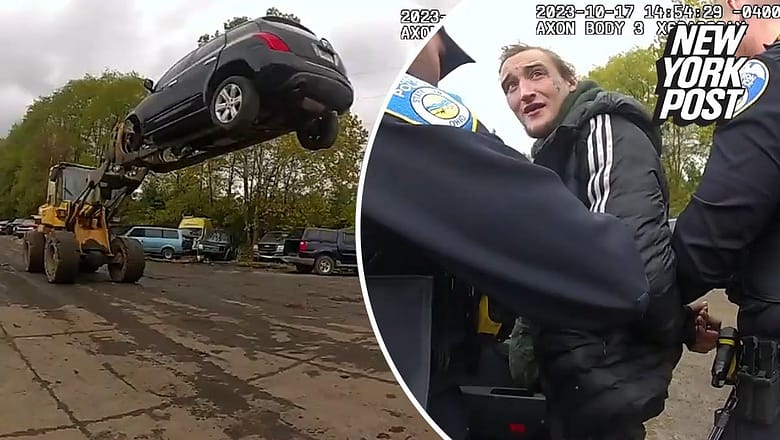 Ohio car theft suspect foiled by quick-thinking forklift operator who holds him 20 feet in the air