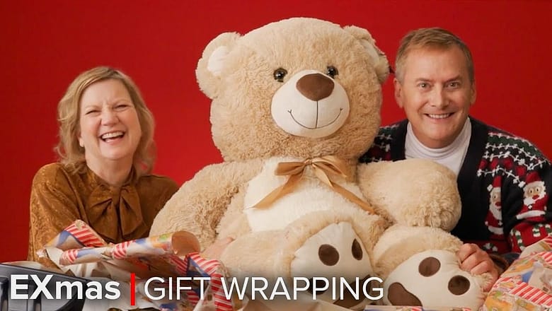 Michael Hitchcock and Kathryn Greenwood Compete in the EXmas Gift Wrapping Challenge