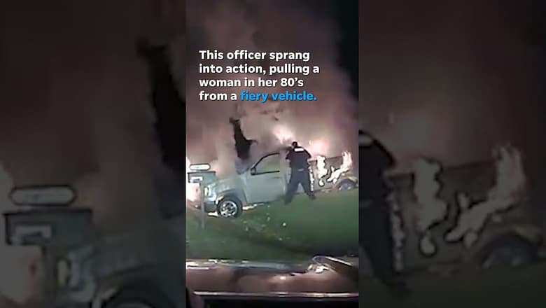 Watch this heroic officer save a woman from a burning vehicle #Shorts