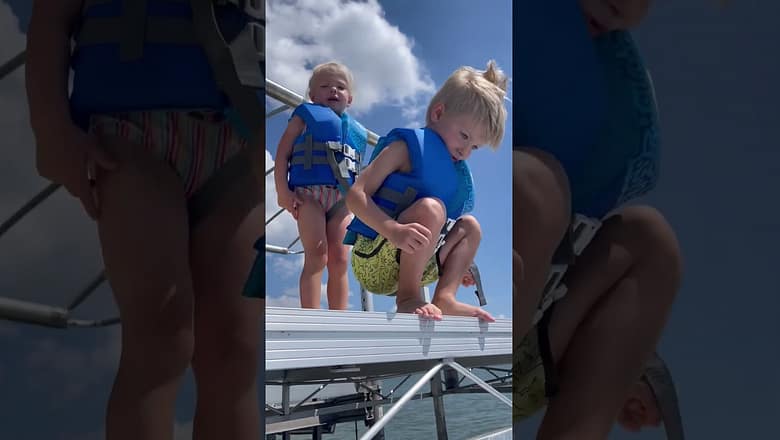 Little girl overcomes fear and leaps into water | Humankind #Shorts
