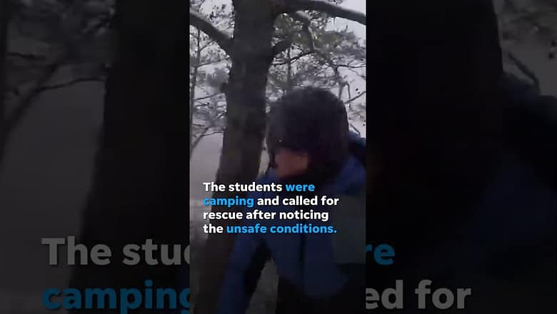 Watch: Snowy helicopter rescue of stranded college students #Shorts