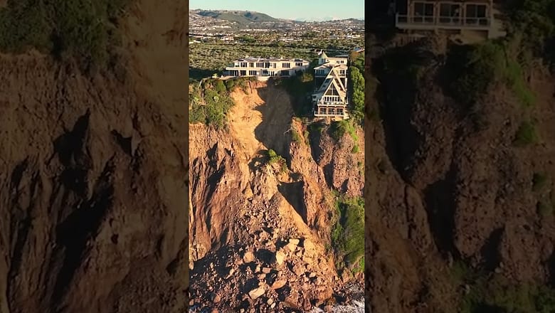 Drone video: Landslide leaves mansions on the edge of a cliff #Shorts