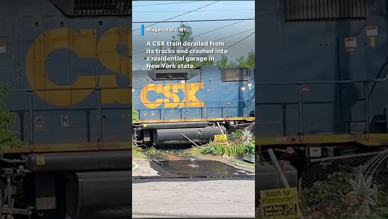 Train derails into residential garage in New York state #Shorts