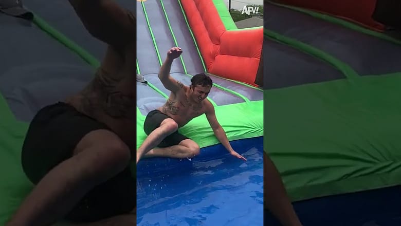 Fall hard or go home! 🤸 #shorts #inflatable #summer #fail #humor