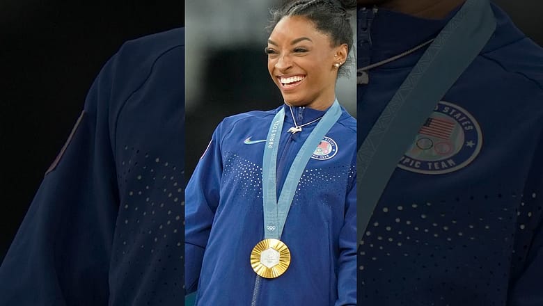 Simone Biles rocks a greatest of all time “GOAT” diamond necklace #Shorts
