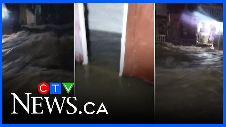 Hurricane floodwaters rush through streets in Santiago de Cuba