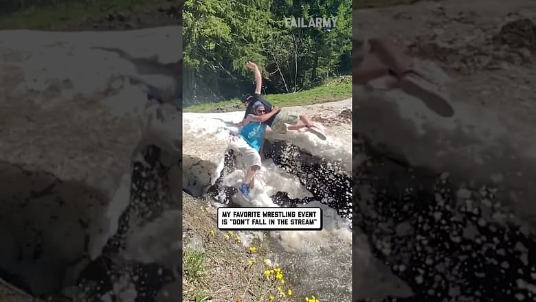Guy Falls Into Stream While Trying To Throw Friend Into It