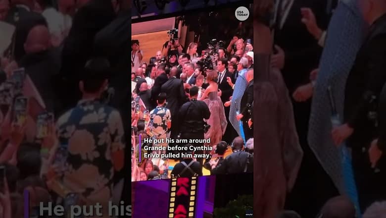 Security rushes to Ariana Grande after fan jumps barricade at ‘Wicked: For Good’ premiere