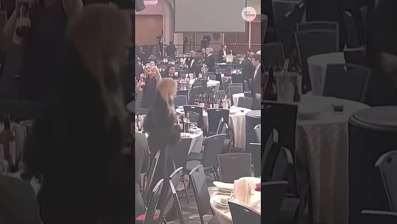See guests grab wine bottles after White House Correspondents’ Dinner shooting